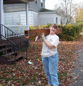 Sally carrying a newel post.